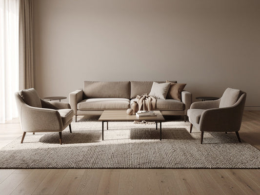 Living room with a large area rug sized to anchor the full seating area