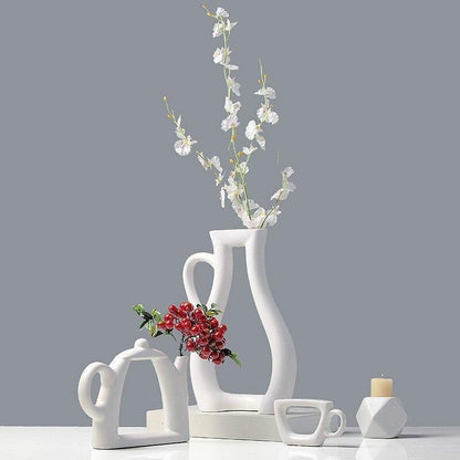 White Ceramic Vases: Teacup, Kettle and Pitcher