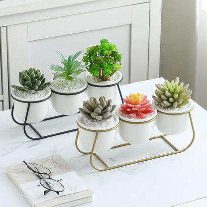 Three White Ceramic Pots on a Metal Stand